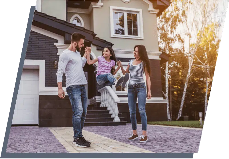 family in front of a house